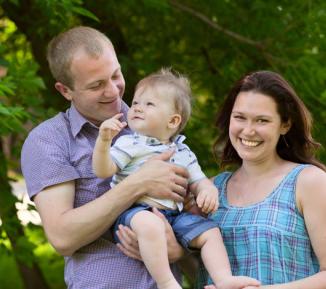 Father, baby and mother