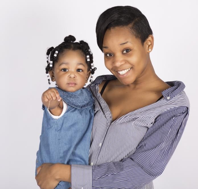 Photo of a mother holding her baby