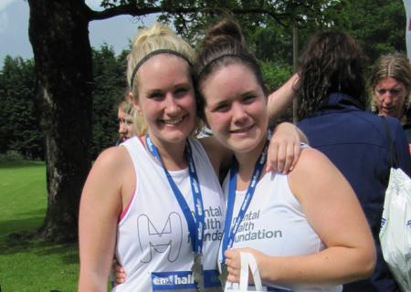 Two MHF runners with medals