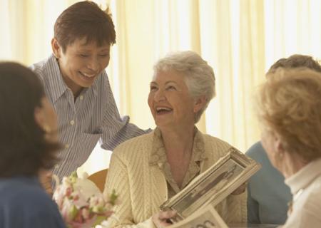 Photo of group of elderly women laughing