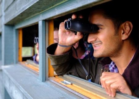 Man with binoculars