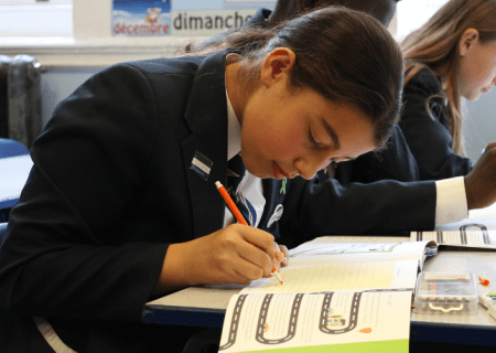 School girl writing