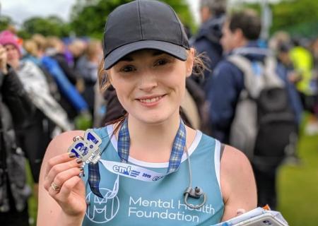 Photo of Jessica Parish Edin with her medal